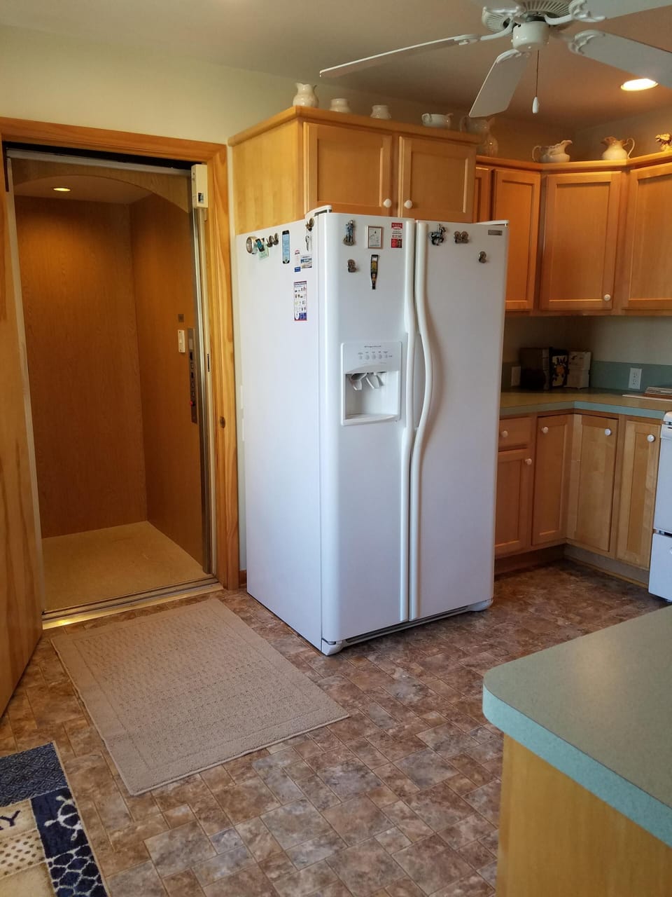 Kitchen, showing access to elevator.