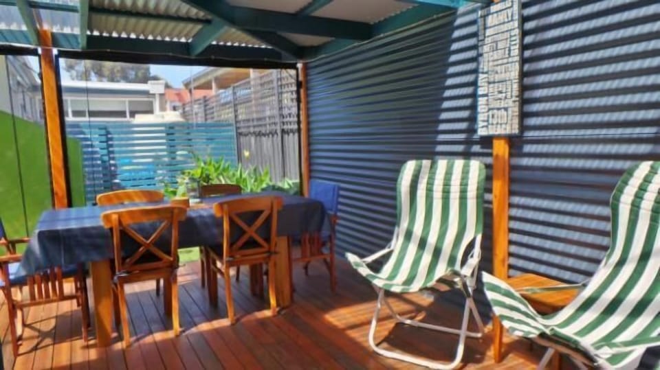 Relaxing outdoor area, view to the playground.