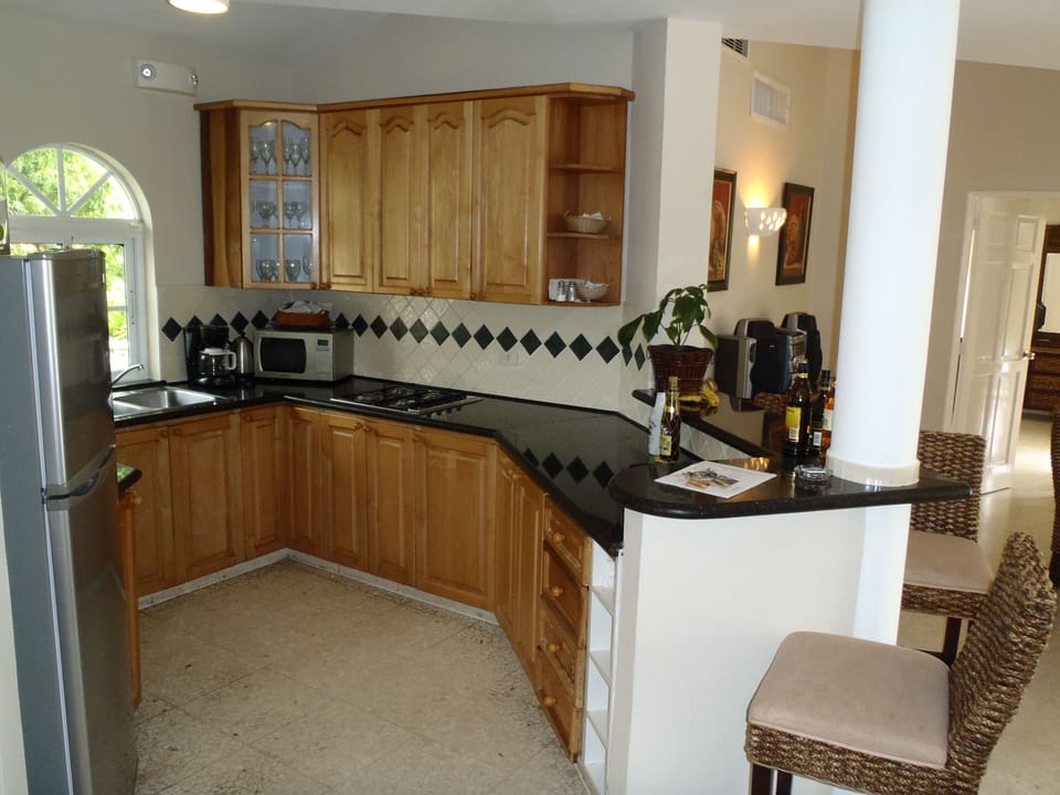 Kitchen With Fridge Stocked with Water, Soda & Beer Daily