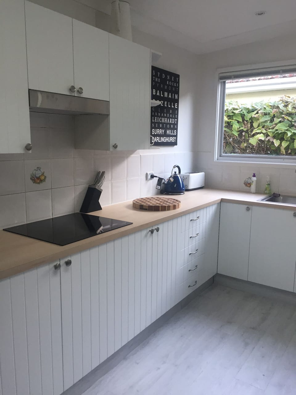 Modern appliances including dishwasher and coffee machine