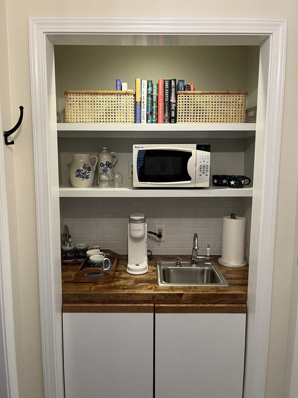 Wet bar with microwave, Keurig coffee maker and lending library 