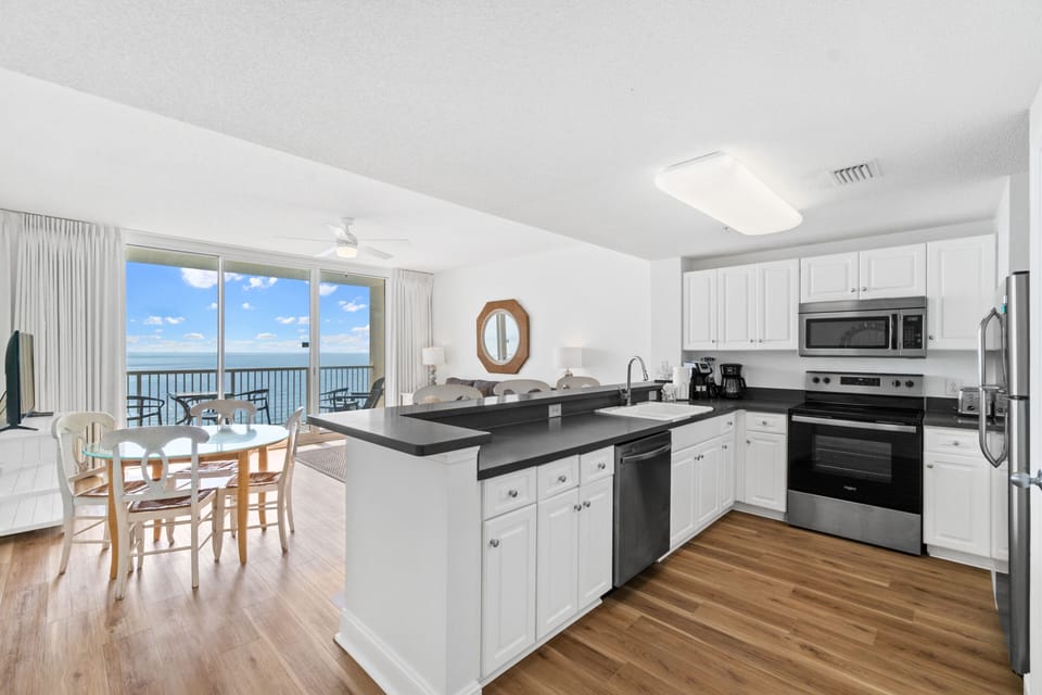 Gourmet kitchen equipped for cooking and dining needs 