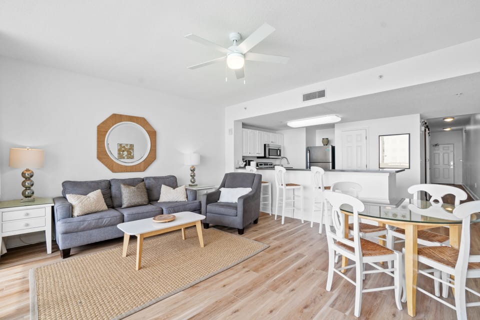 Large living area with ocean views and comfortable queen memory bed pullout