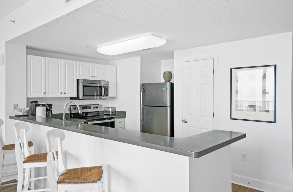 Gourmet kitchen equipped for cooking and dining needs 