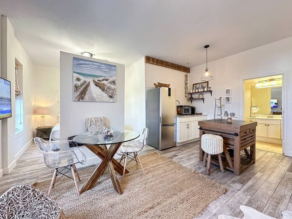 Dining table seats 3-4 and can double as a workstation