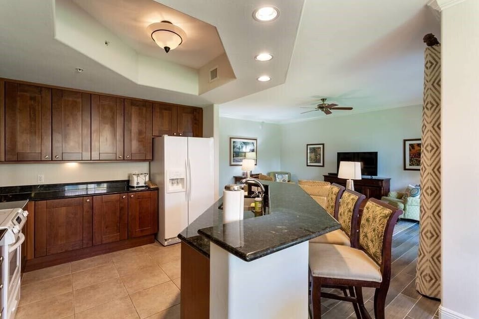 3 high top seats at kitchen counter