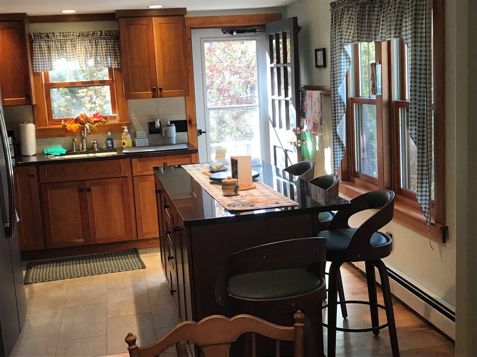 Kitchen with door to deck