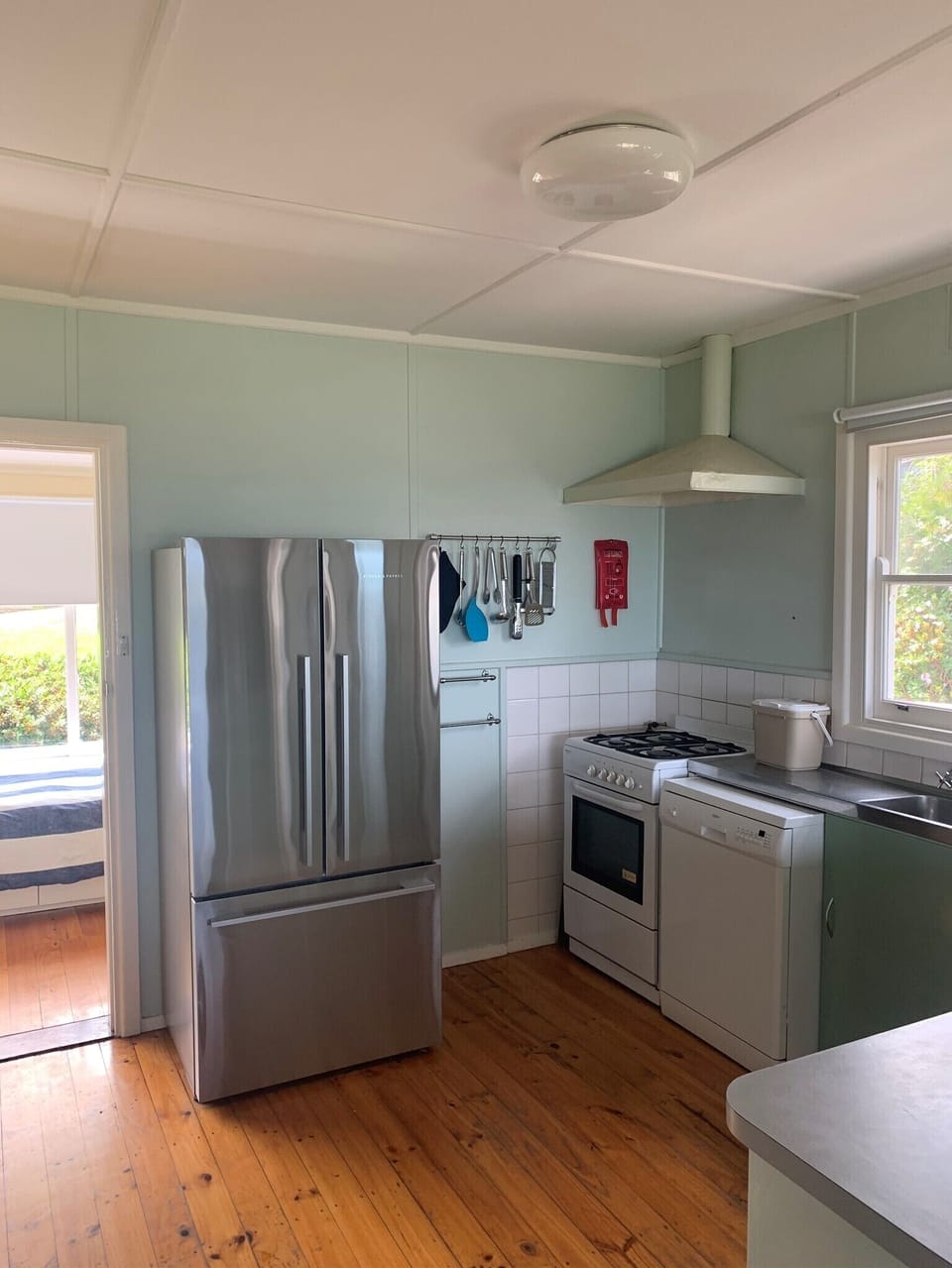 Well equipped kitchen, with dishwasher, gas oven and large French door fridge.
