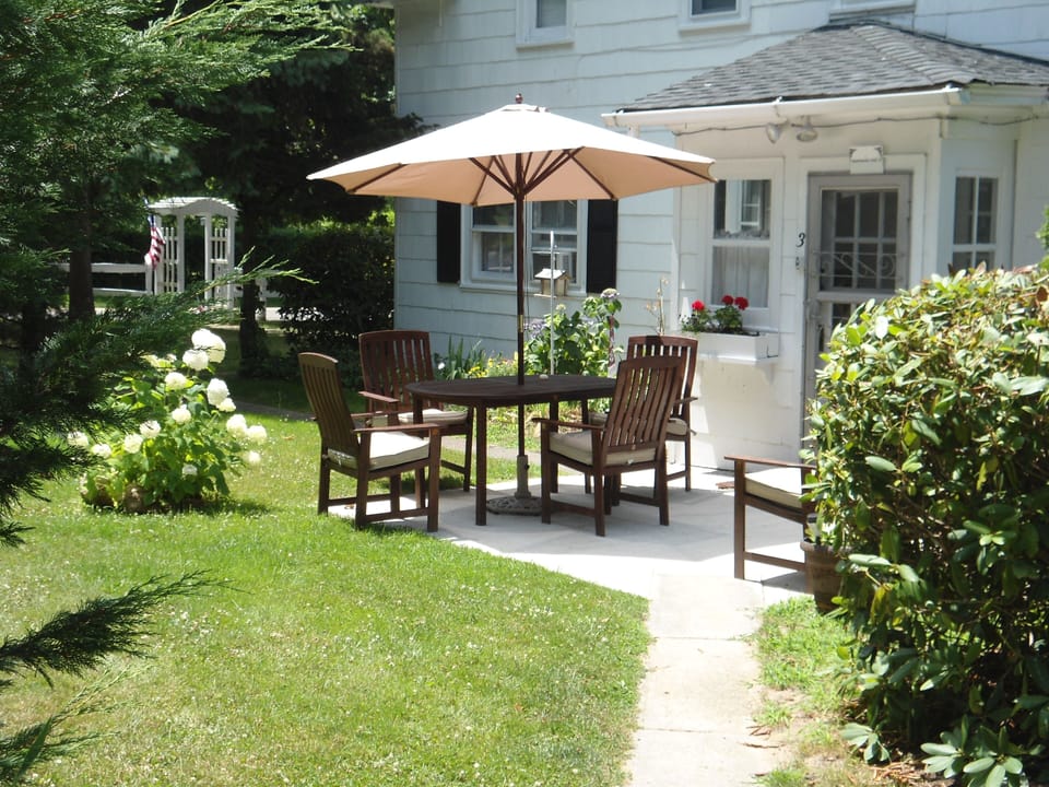 Private patio with gas grill.