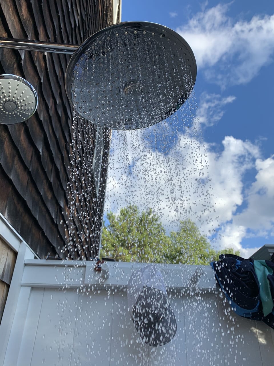 Brand new Walpole Woodworker 6'x5' outdoor shower w/ rain shower and handheld.