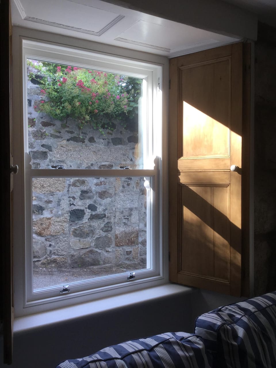 Double glazed wooden sash windows to the front