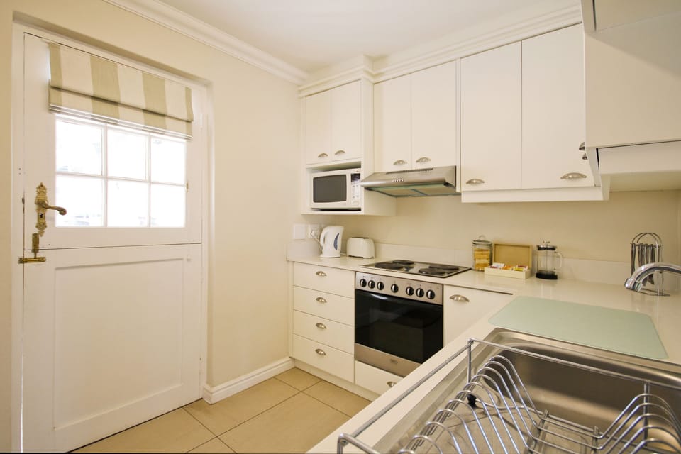 Fridge and Freezer, washing machine and all the pots and pans you need 