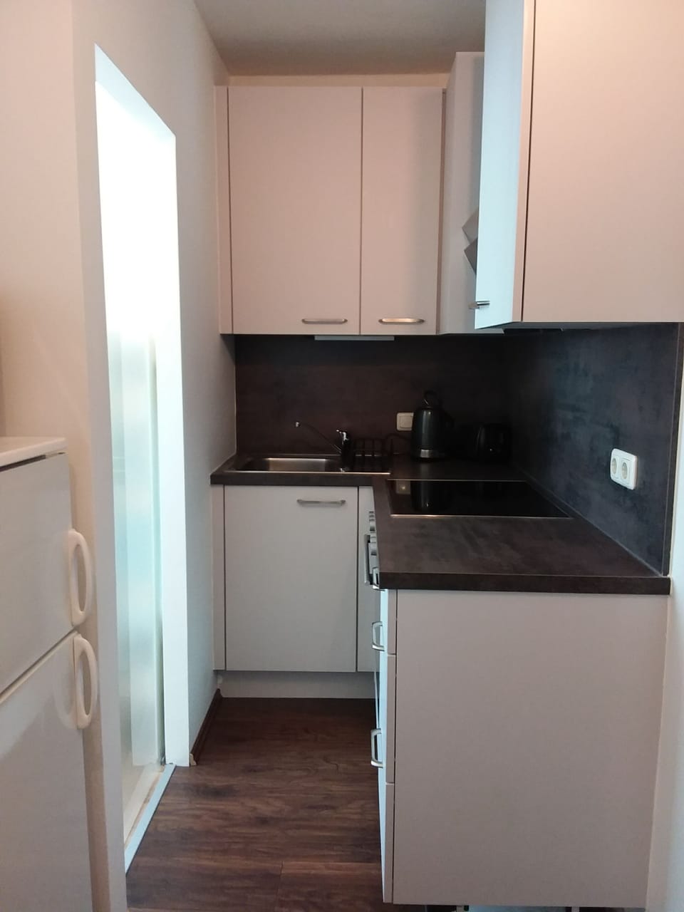 

 crockery, cutlery pots, pans cooker, microwave, hob & fridge freezer for use.