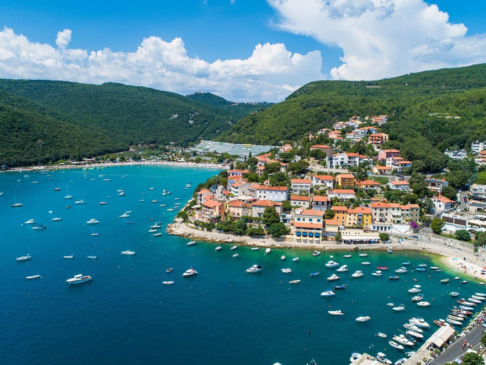 Rabac beach and harbour view