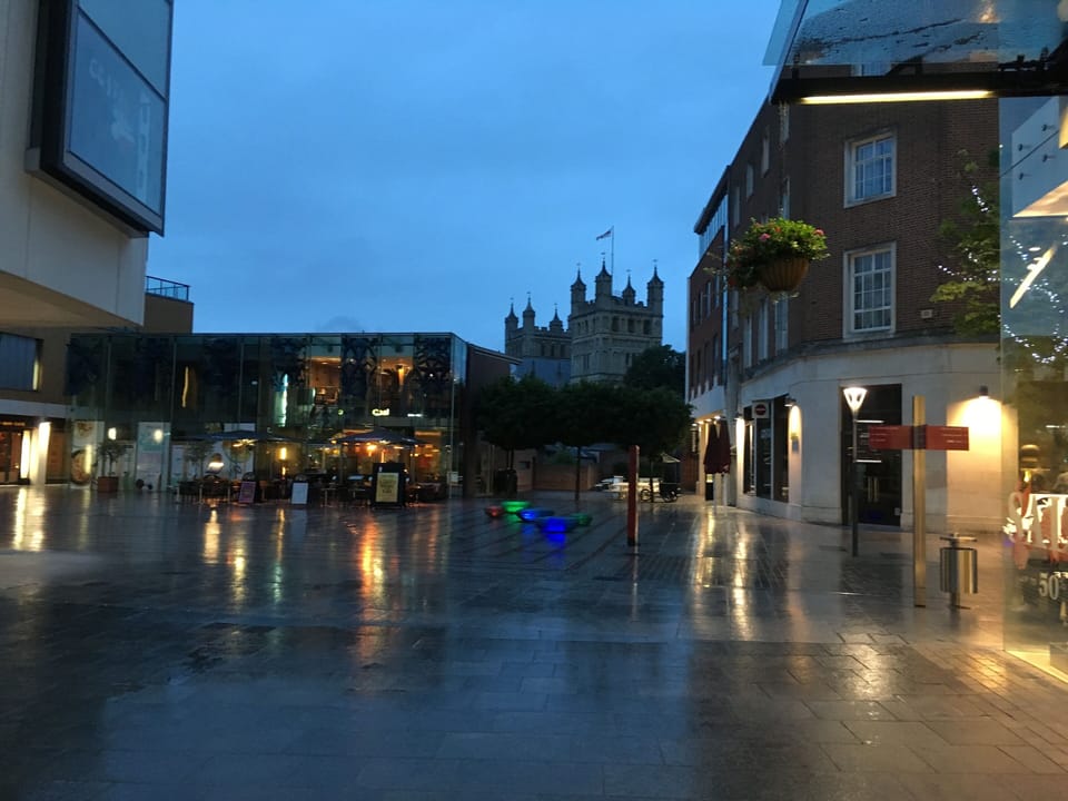 The apartment building at night with views over to Exeter Cathedral