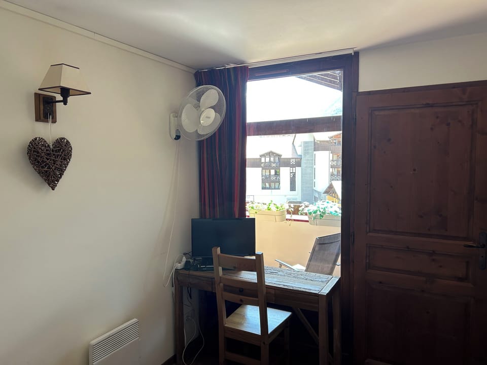 Main bedroom - desk overlooking balcony provides a lovely workspace.