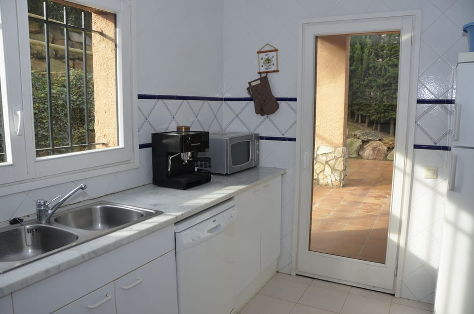 Kichen access to terrace. Sa Punta Costa Brava