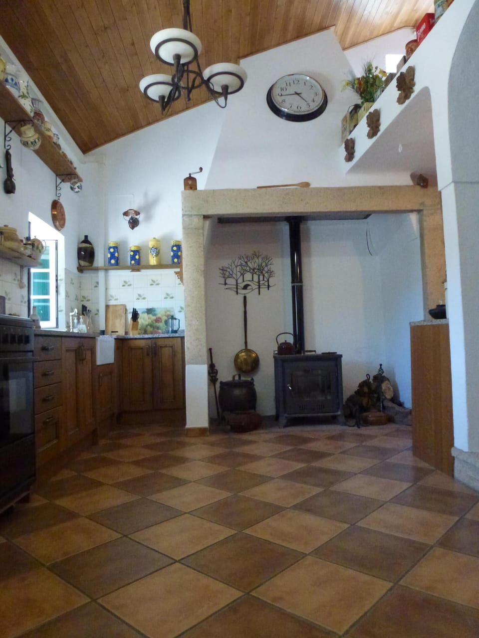 Fireplace in the kitchen with the woodburner