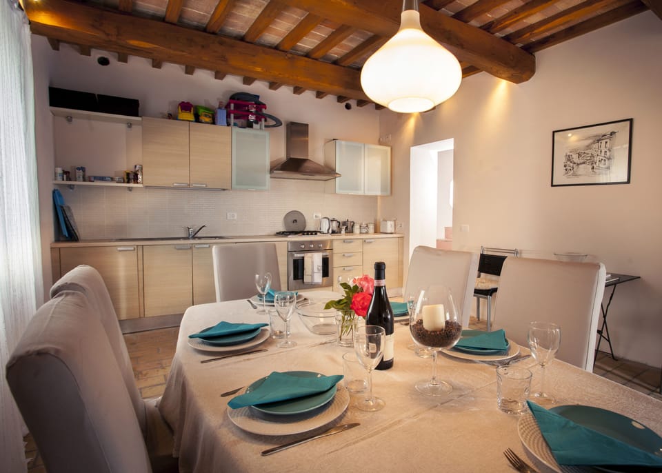 Lovely bright kitchen with dining area on lower floor.