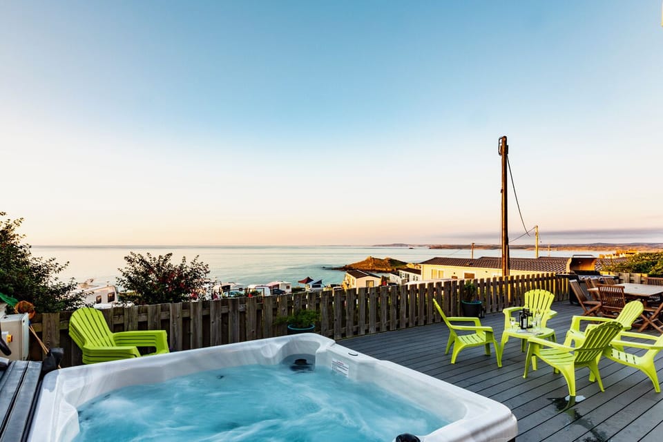 Hot Tub seats 6 with views of The Island, Godrevy, and North Cornwall coast