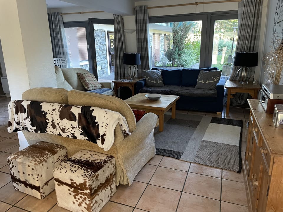 living area with door to piste / pool