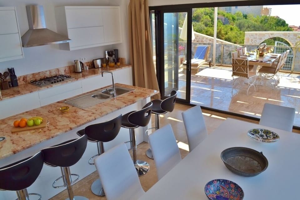 Dolphin Bay Villa kitchen & outside dining