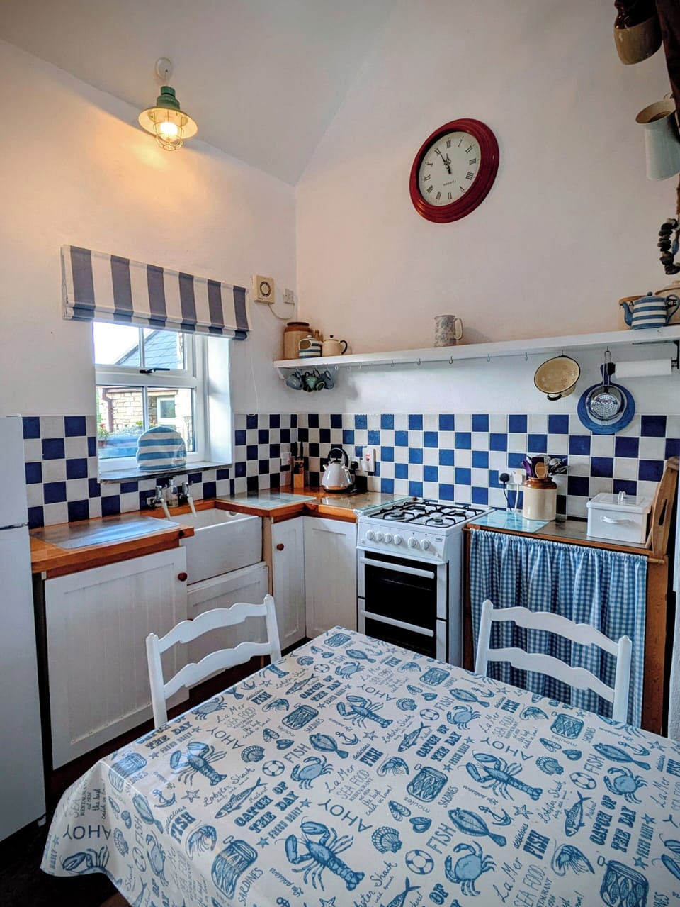 Seaside kitchen with old Belfast sink.