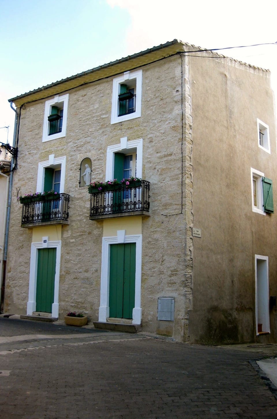 The authentic front of the house with original Medieval stone & wooden shutters.
