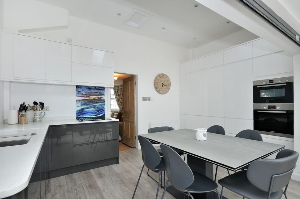 Kitchen . Table extends to accomodate 10