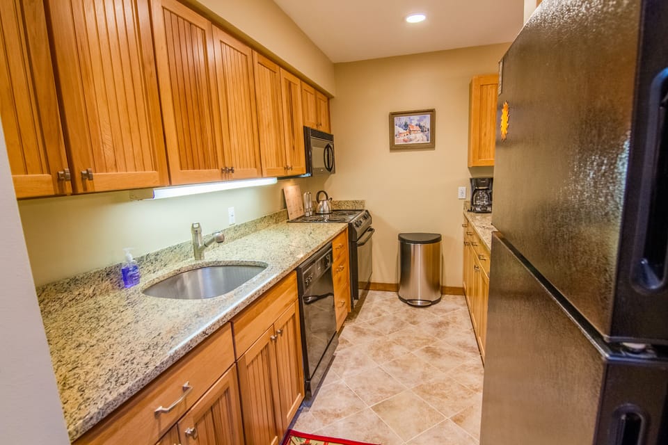 Upgraded kitchen w/ plenty of dishes, cooking utensils (coffee, spices etc)