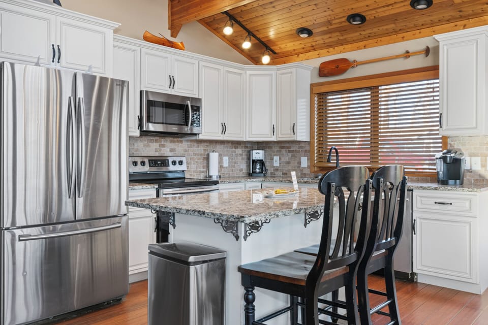 Kitchen island for ample work space and additional seating. 