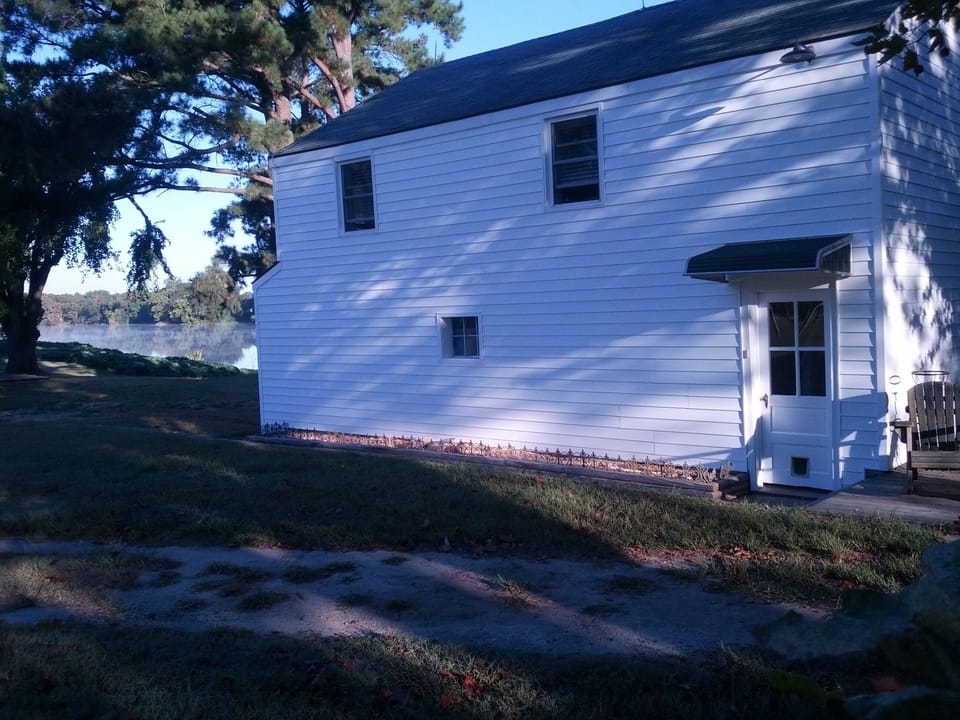 apartment on 2nd floor of this newly sided building. Deck to the right.