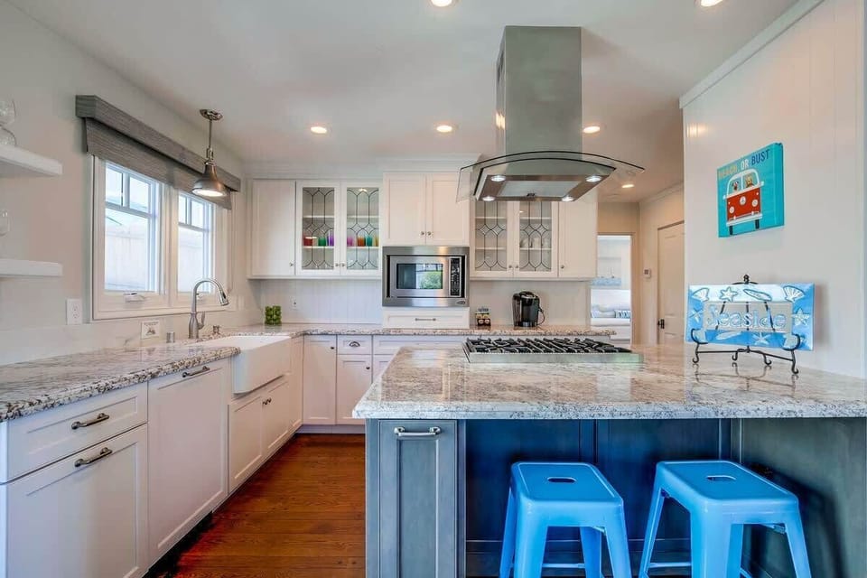 Bar seating at kitchen counter.