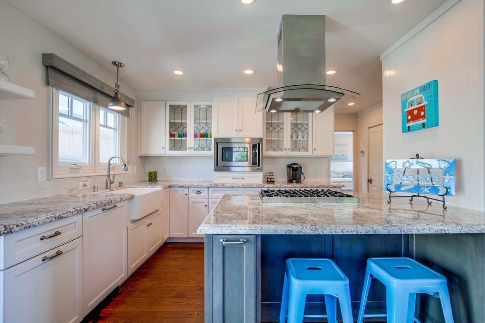 Bar seating at kitchen counter.