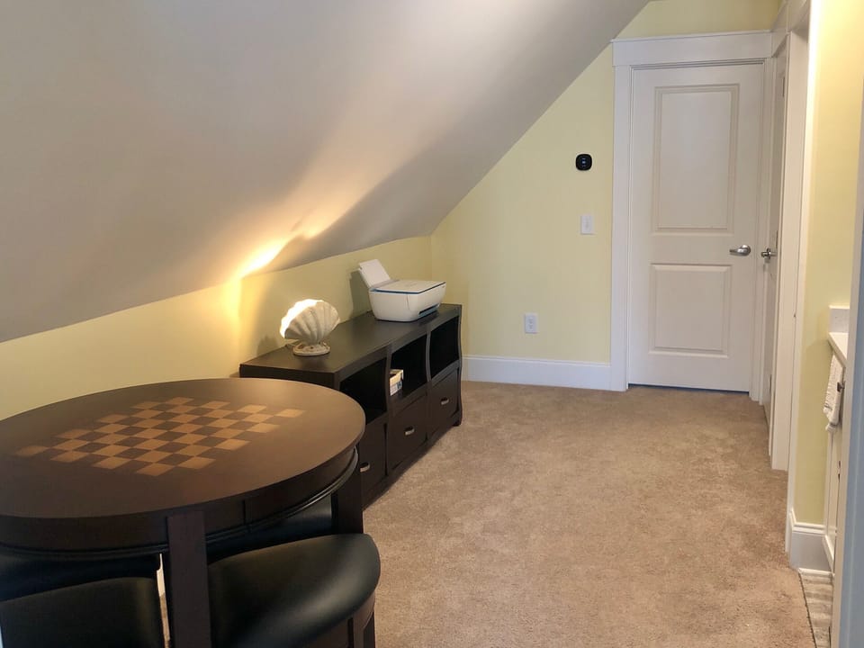 5/8 Upstairs Hallway Game table, games and puzzles.  Even a printer available. 