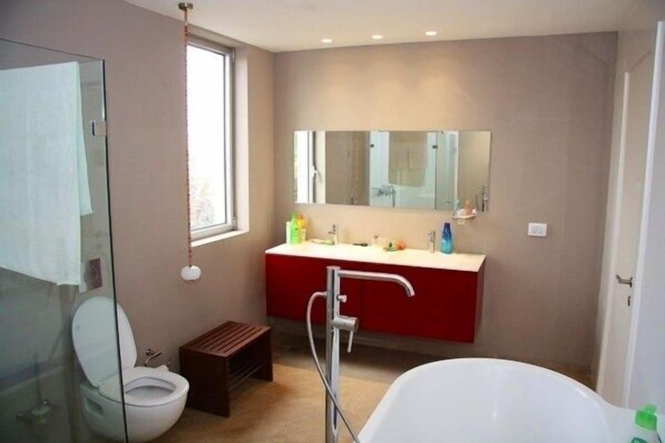 Alternate ensuite state of the art bathroom with bath and shower on second floor