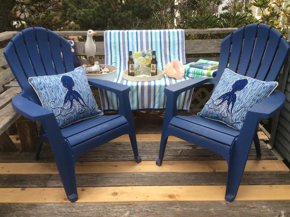 Front deck with Adirondack chairs from back yard.  