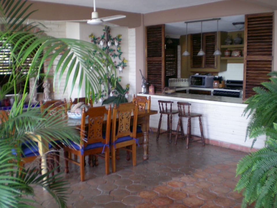Dining showing kitchen bar area