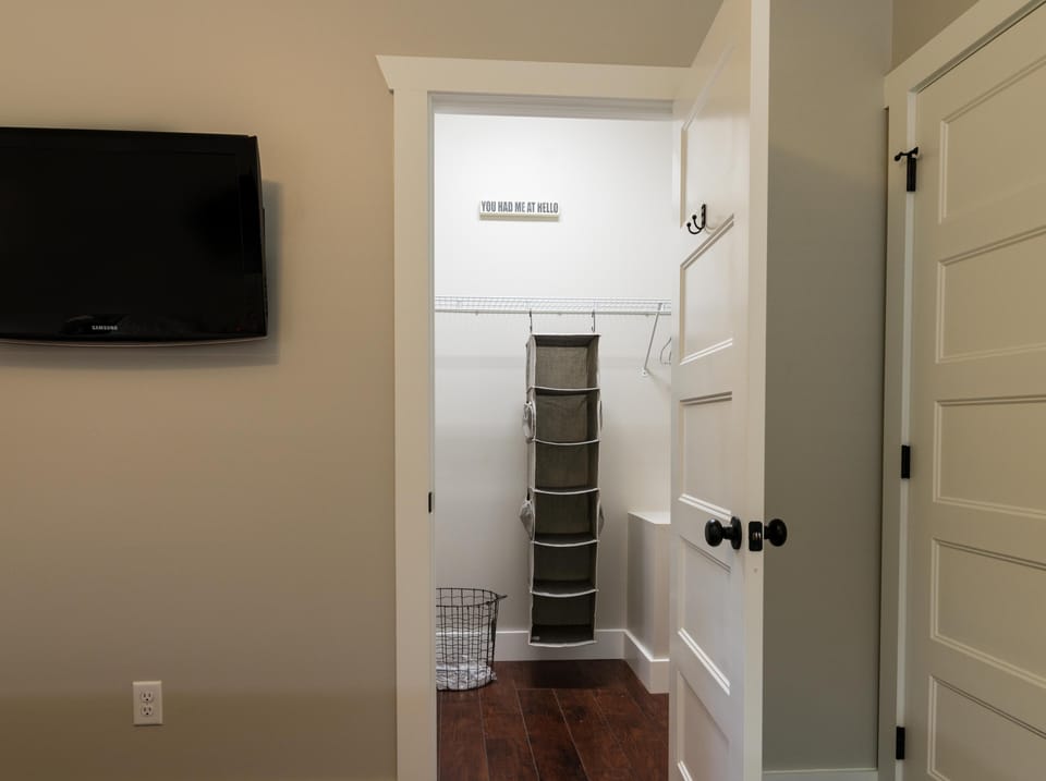 Full size walk in closet.