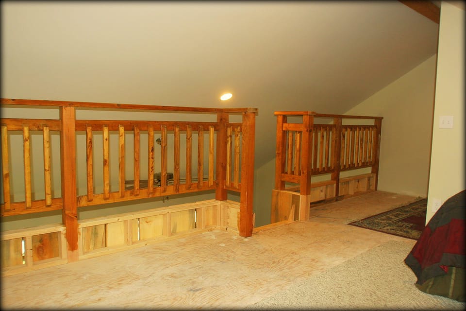 The loft railing. There is a gate (not pictured) at the top of the stairs. 