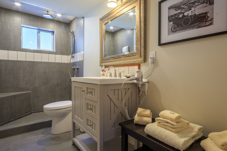 Main floor bathroom with walk in rain shower. 
