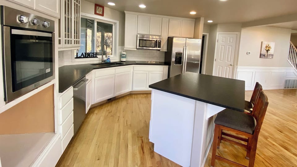 Kitchen with plenty of counter space and stainless appliances in the main house