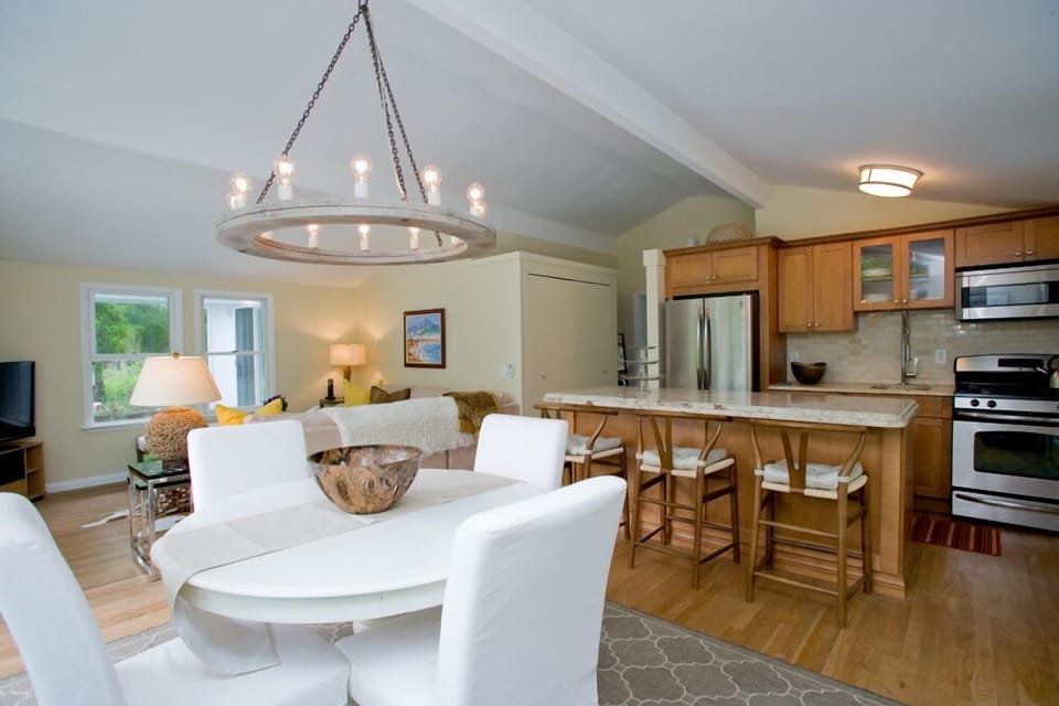 Dining table has leaves so it can seat 6-8 people. 