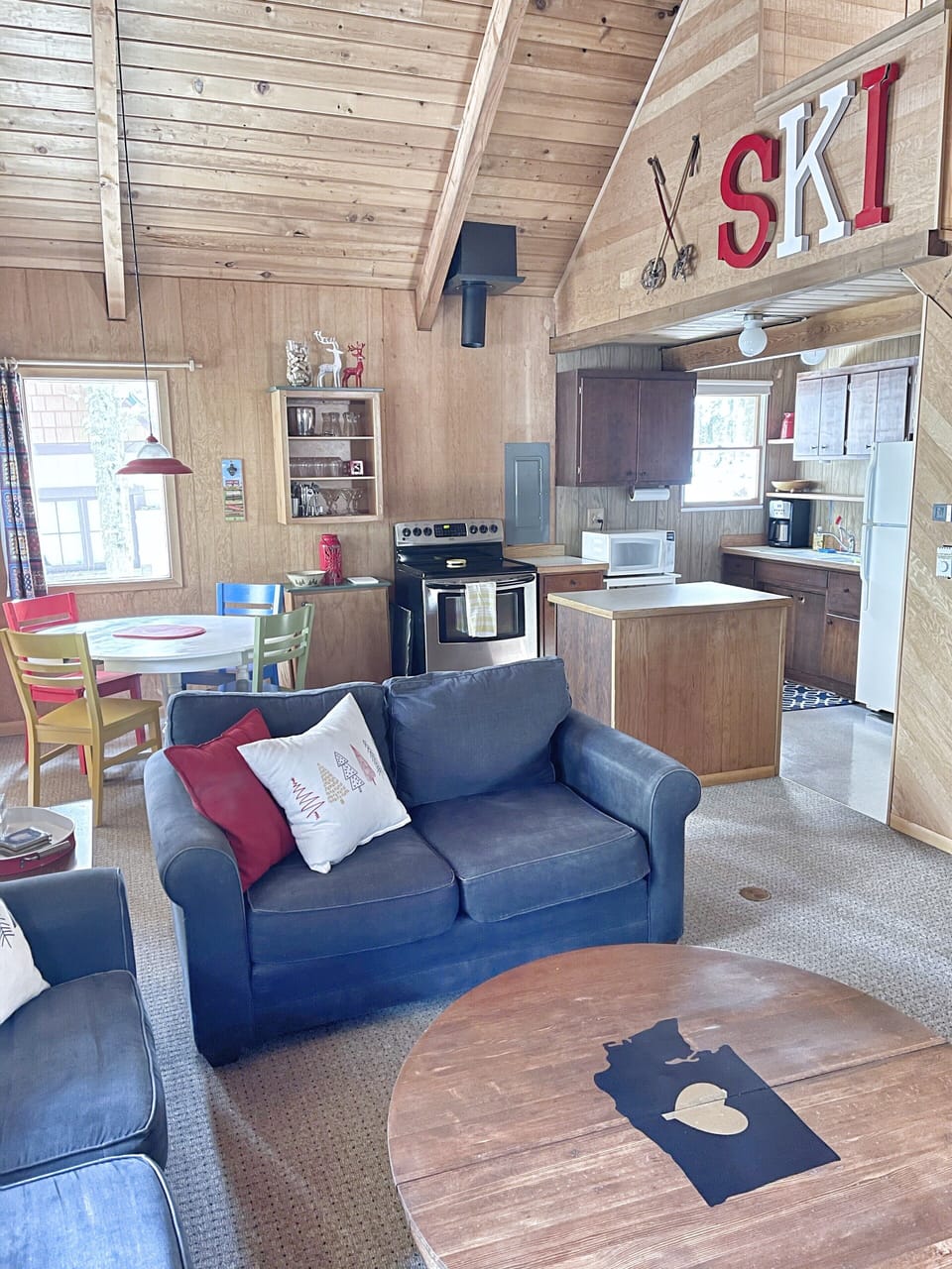 Living room with views of dining and kitchen