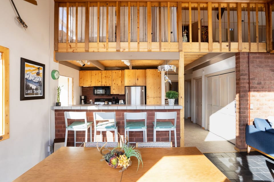 Kitchen with bar behind diningroom table