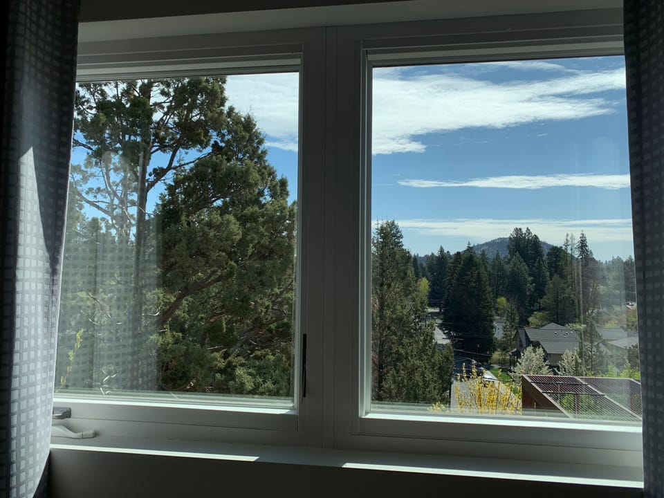 View of Pilot Butte from master bedroom East windows