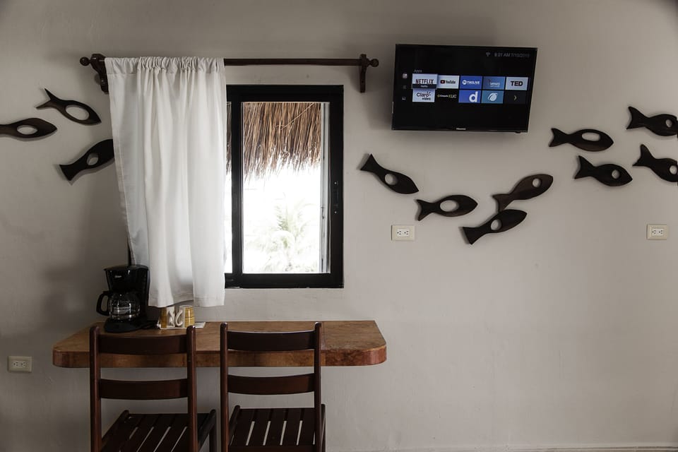 All upper suites also contain desk space, coffee maker and television. 