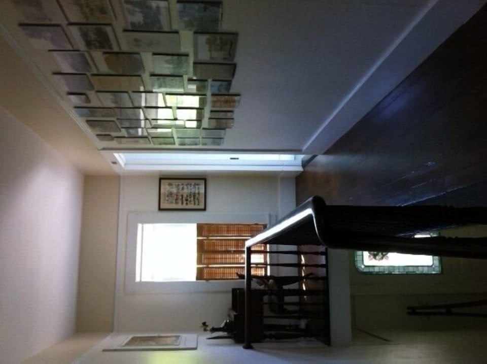 hallway with vintage photos of Saugatuck