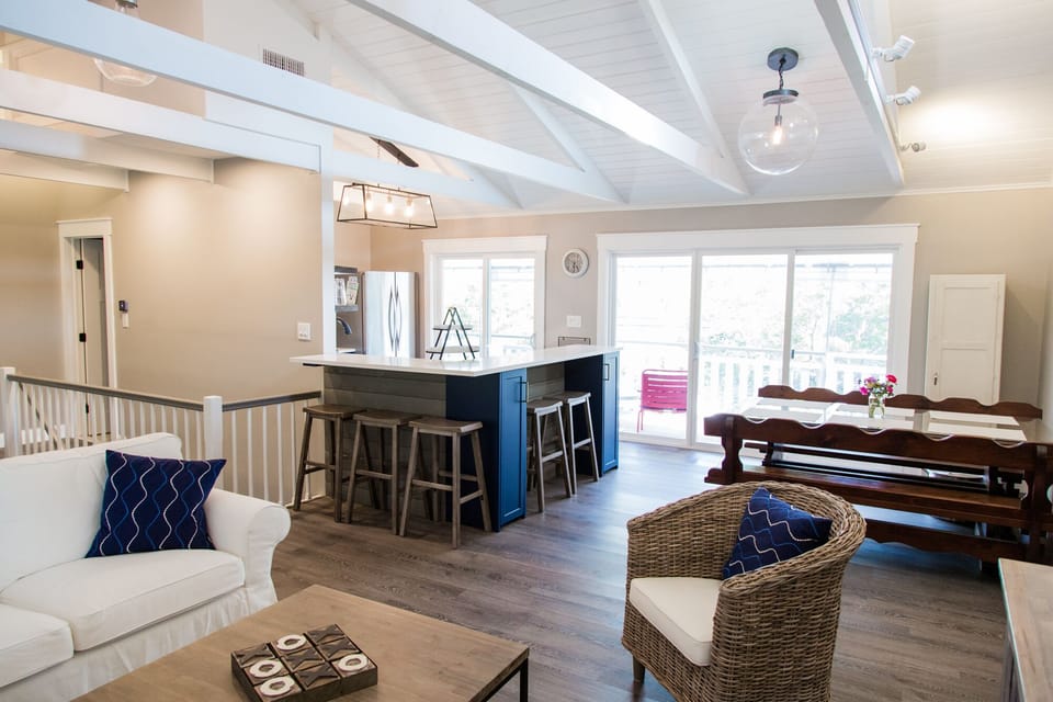 Towards the front of the house, are the kitchen and dining room.