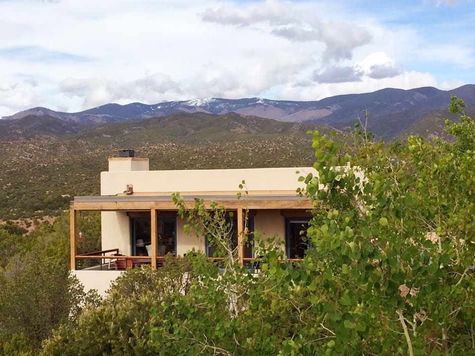 Nestled in the foothills of the Sangre de Cristos, 5 min to Santa Fe Plaza.